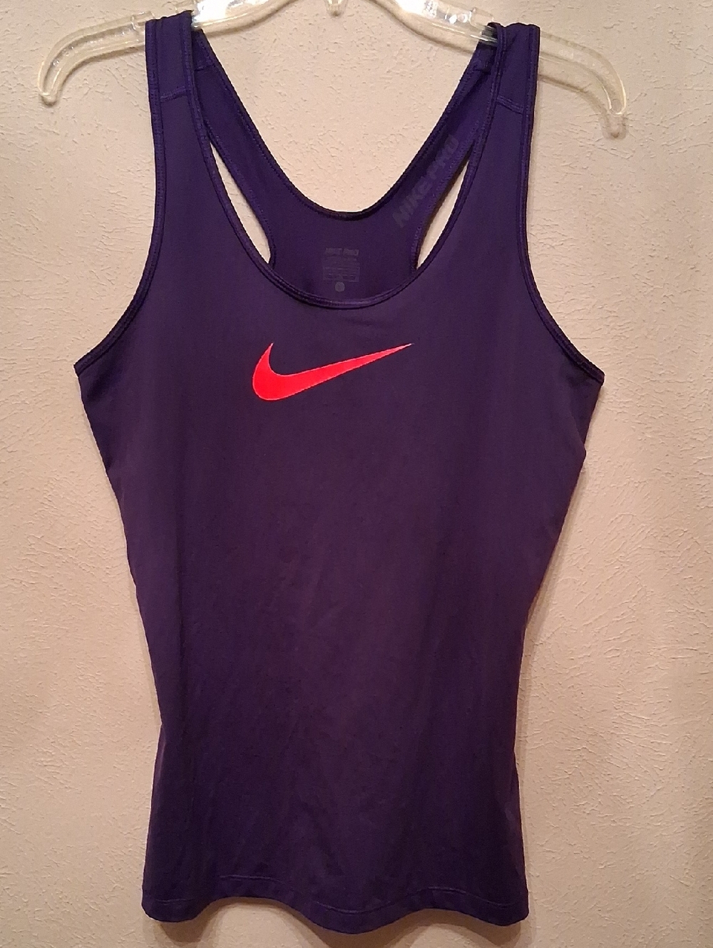 Nike Pro tank top in purple featuring a bright orange Swoosh logo Size Large